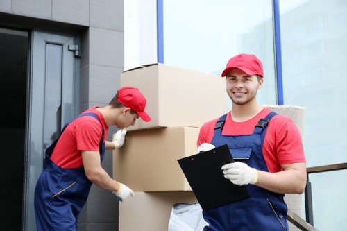 House removalists loading furniture for a Newington home move