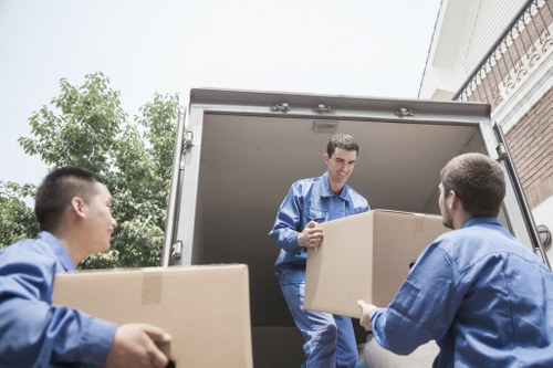 A local van service handling a small move in Newington