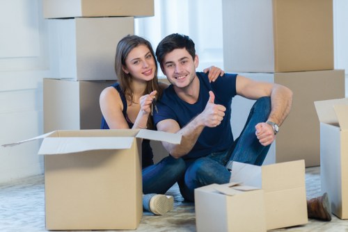 Packed boxes and furniture ready for transport during a Newington removal
