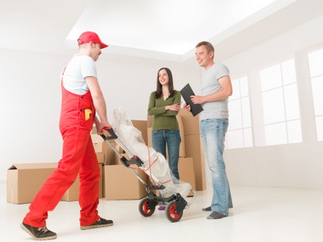 Local removals vehicle loading household items in Newington