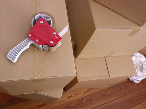 Local moving team handling furniture loading in Newington