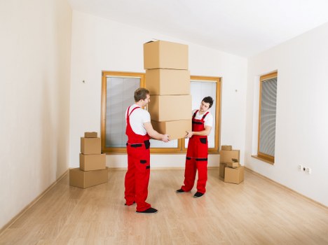 Moving boxes and home contents prepared for transport in Newington