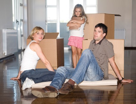 Sorted recyclable materials including cardboard, wood, and metal from a move